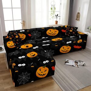 Halloween couch and pillow covers in a small apartment living room.